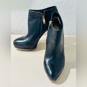 Vince Camuto Black leather, high heeled booties.